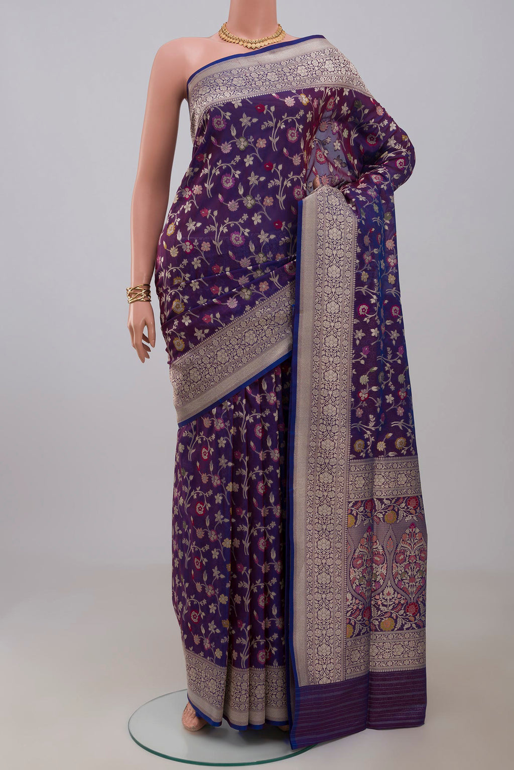 Blue Banarasi Saree with Fancy on the body and Fancy Border.  displayed on a mannequin