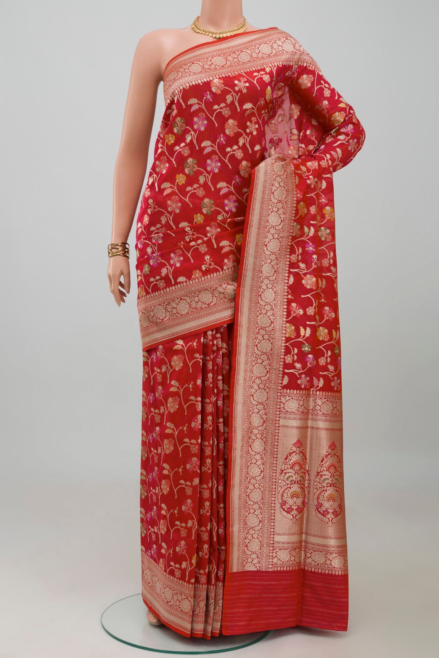 Red Banarasi Silk Saree with Zari Brocade on the body and Zari Border.  displayed on a mannequin