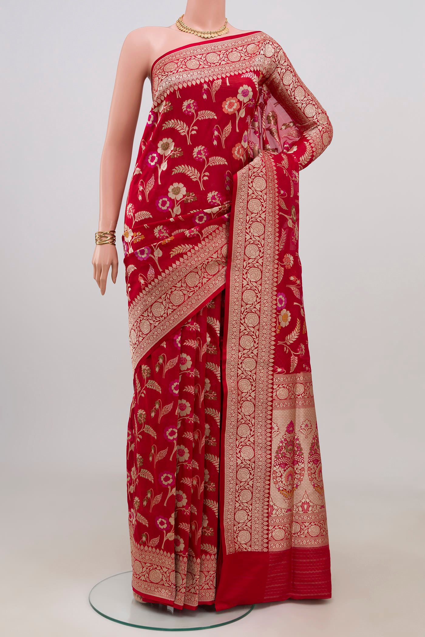 Red Banarasi Silk Saree with Zari And Thread Butta on the body and Fancy Border.  displayed on a mannequin