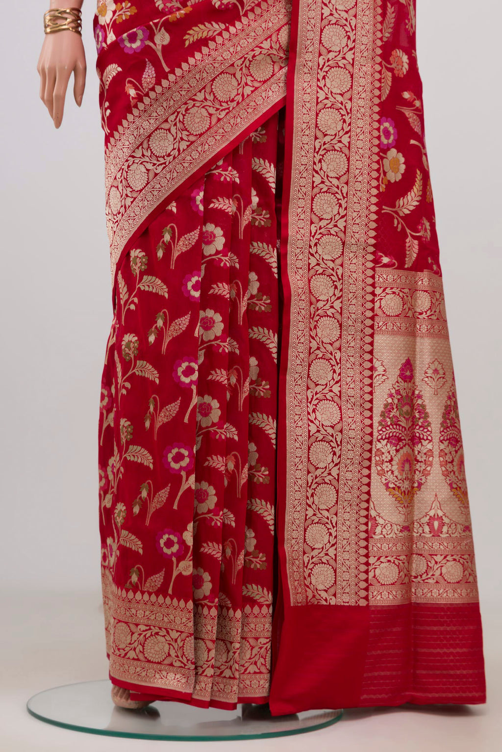 Pleats and pallu of Red Banarasi Silk Saree with Zari And Thread Butta on the body and Fancy Border. 
