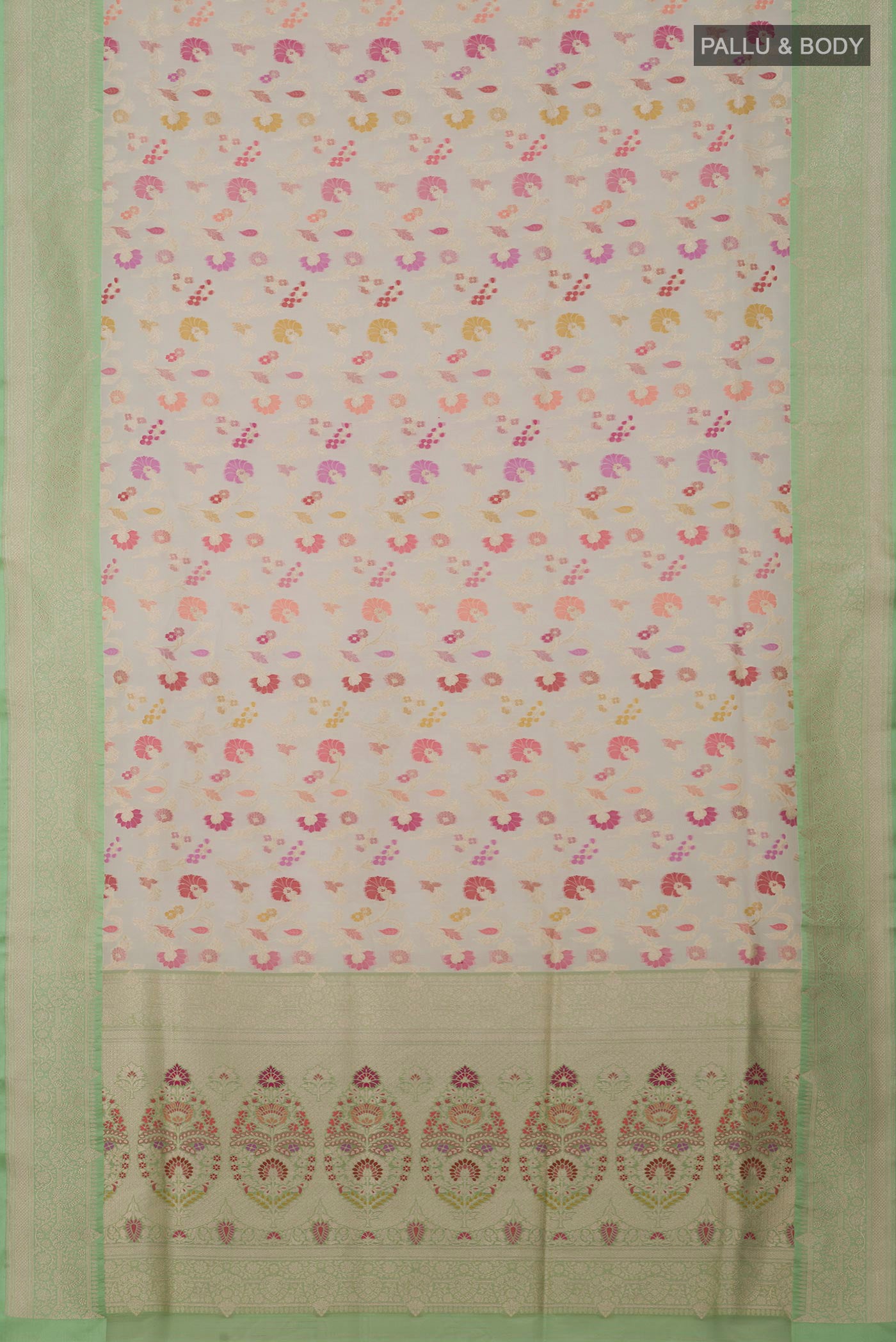 Flat view of Cream Banarasi Silk Saree with Zari And Thread Butta on the body and Zari Border. 
