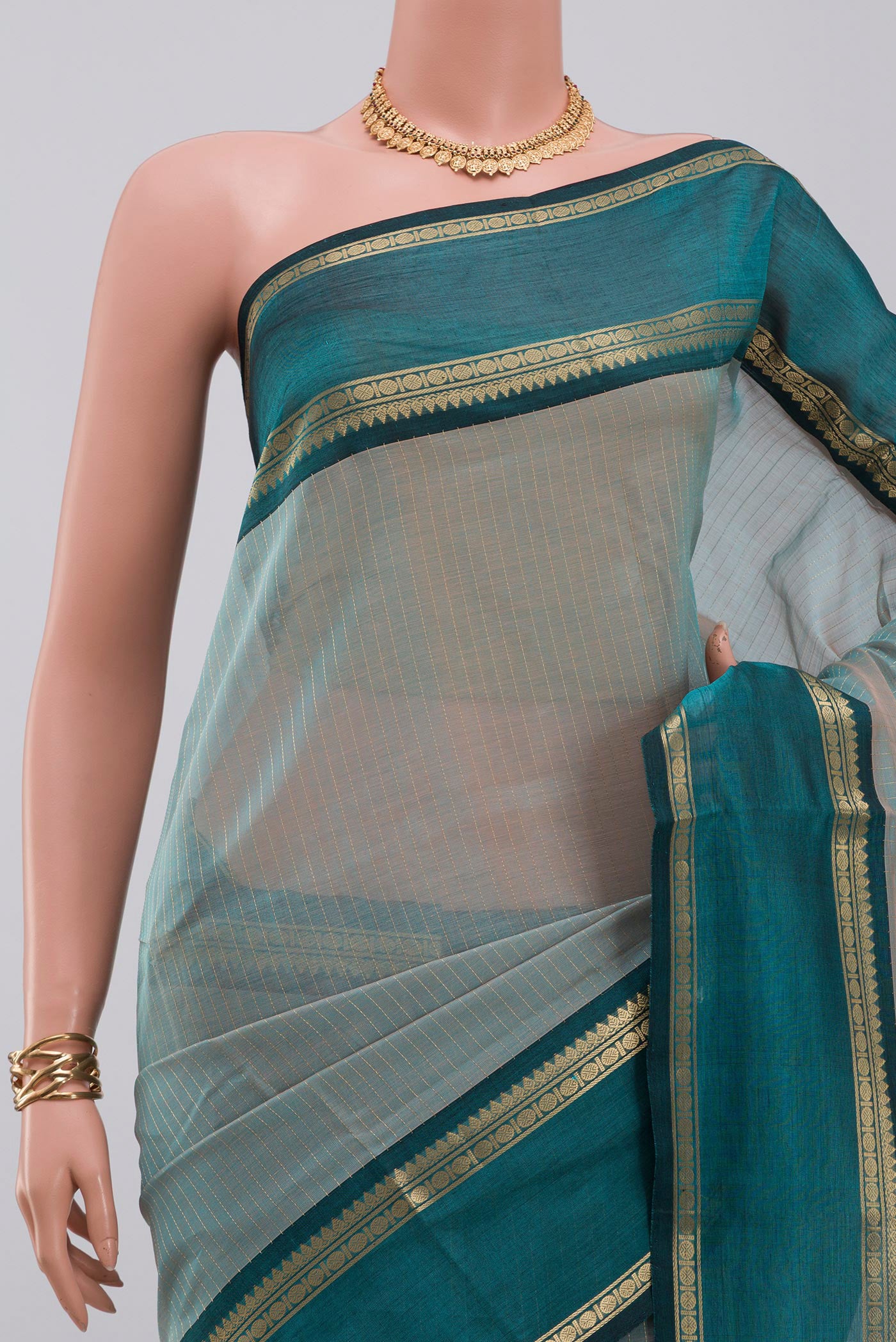 Border image of Light Blue Silk Cotton Saree with Stripes on the body and Zari Border. 