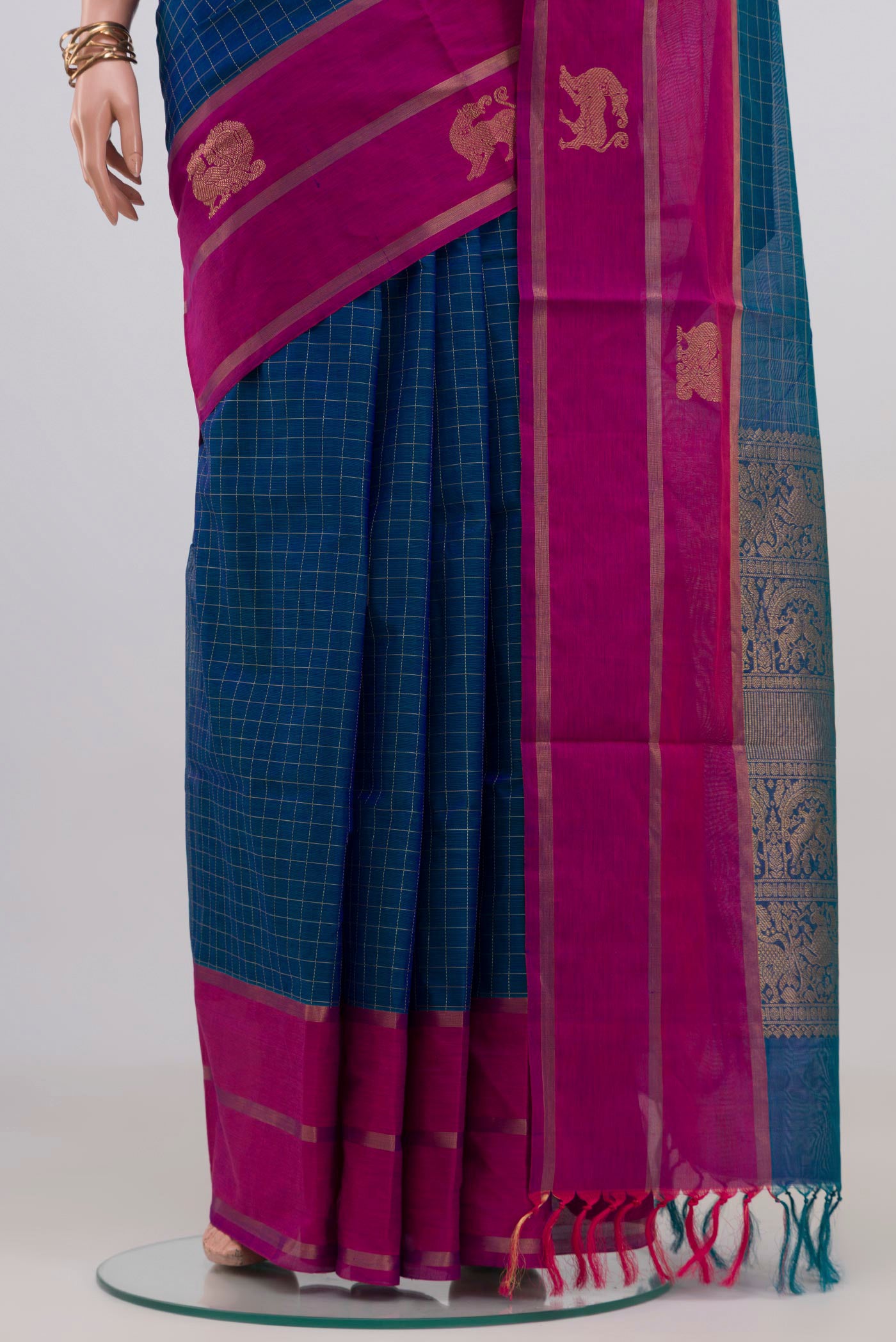 Pleats and pallu of Blue Silk Cotton Saree with Checked design on the body and Plain Border. 