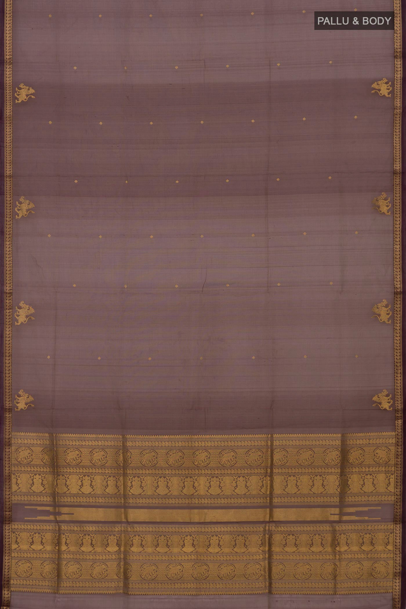 Flat view of Brown Silk Cotton Saree with Zari Butta on the body and Thin Zari Line. 