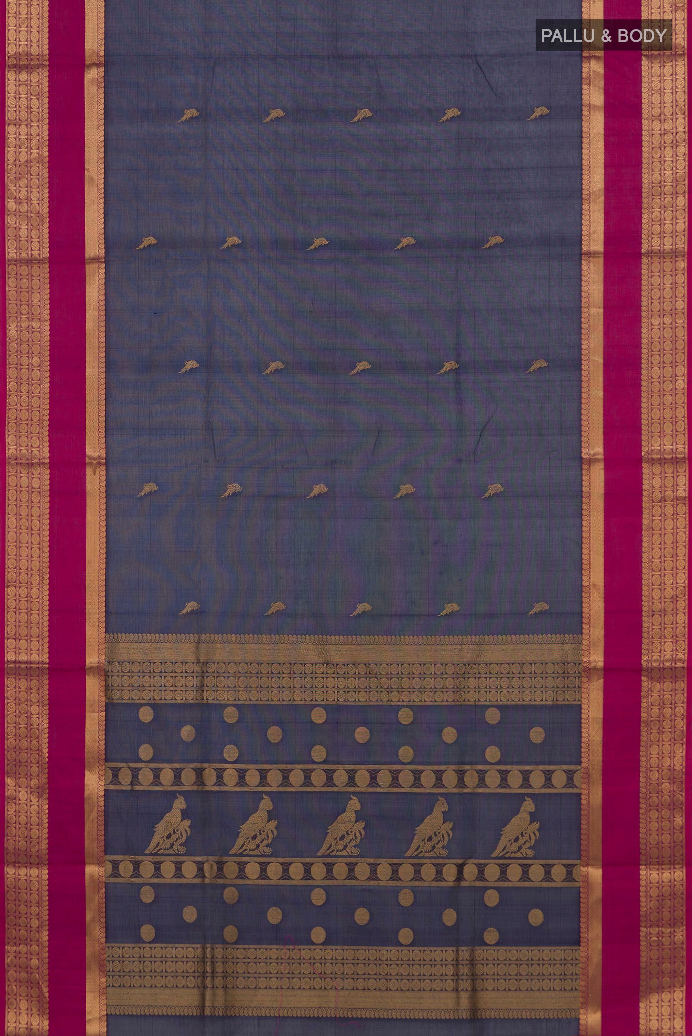 Flat view of Navy Blue Silk Cotton Saree with Zari Butta on the body and Zari Border. 