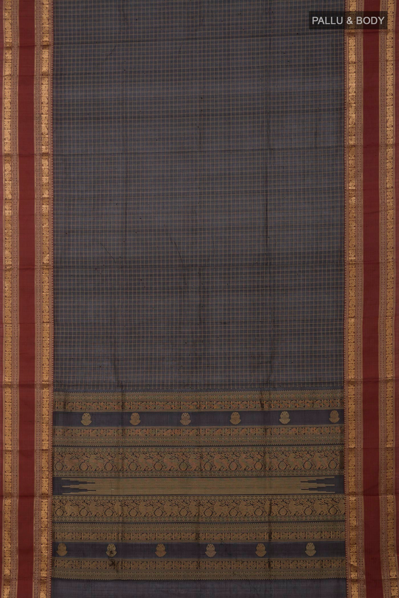 Flat view of Black Silk Cotton Saree with Checked design on the body and Zari Border. 