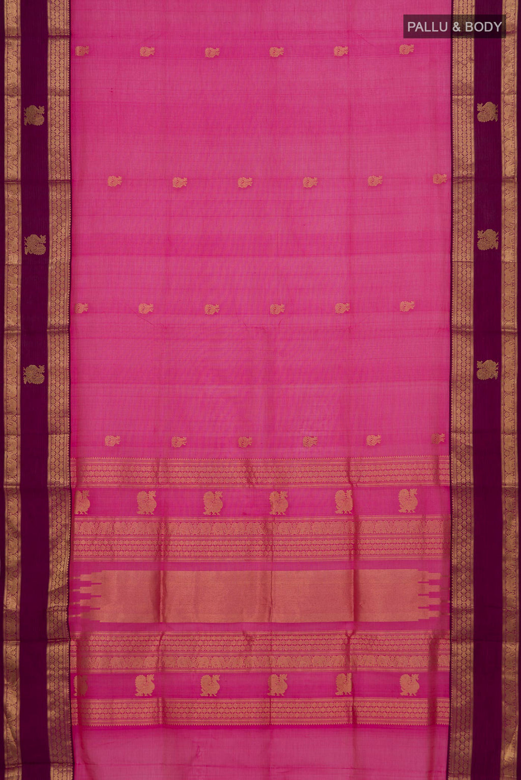 Flat view of Pink Silk Cotton Saree with Zari Butta on the body and Zari Border. 