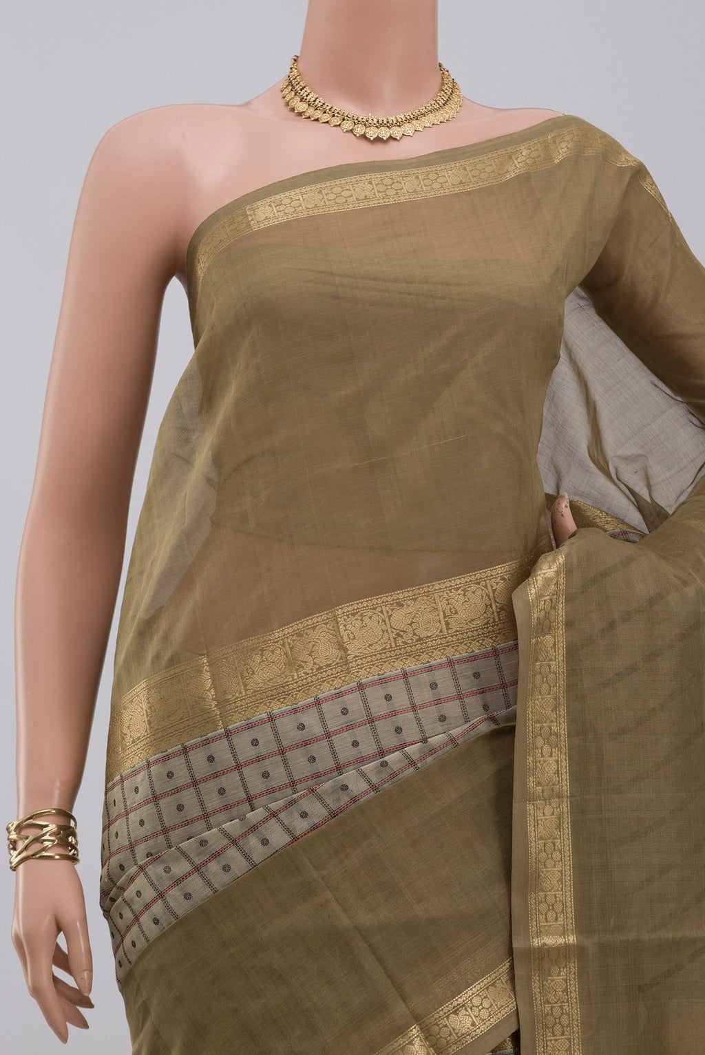 Border image of Cream Silk Cotton Saree with Checked design on the body and Zari Border. 