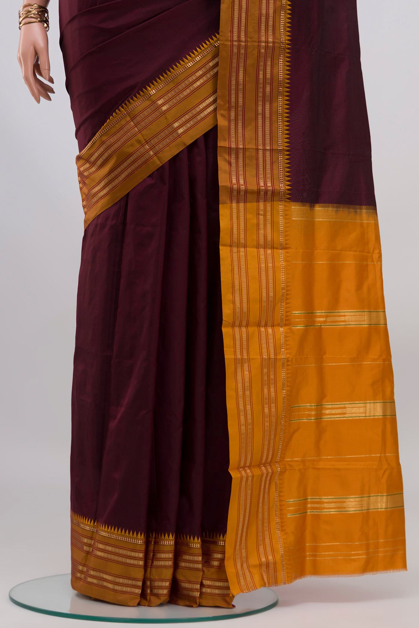 Pleats and pallu of Coffee Brown Narayanpet Silk Saree with Plain Body and Zari Border. 