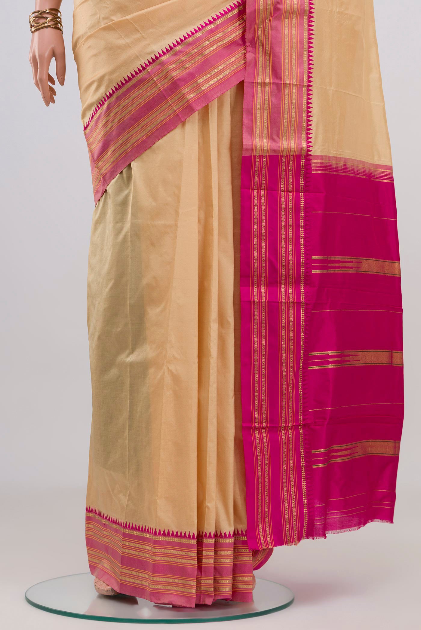 Pleats and pallu of Cream Narayanpet Silk Saree with Plain Body and Zari Border. 