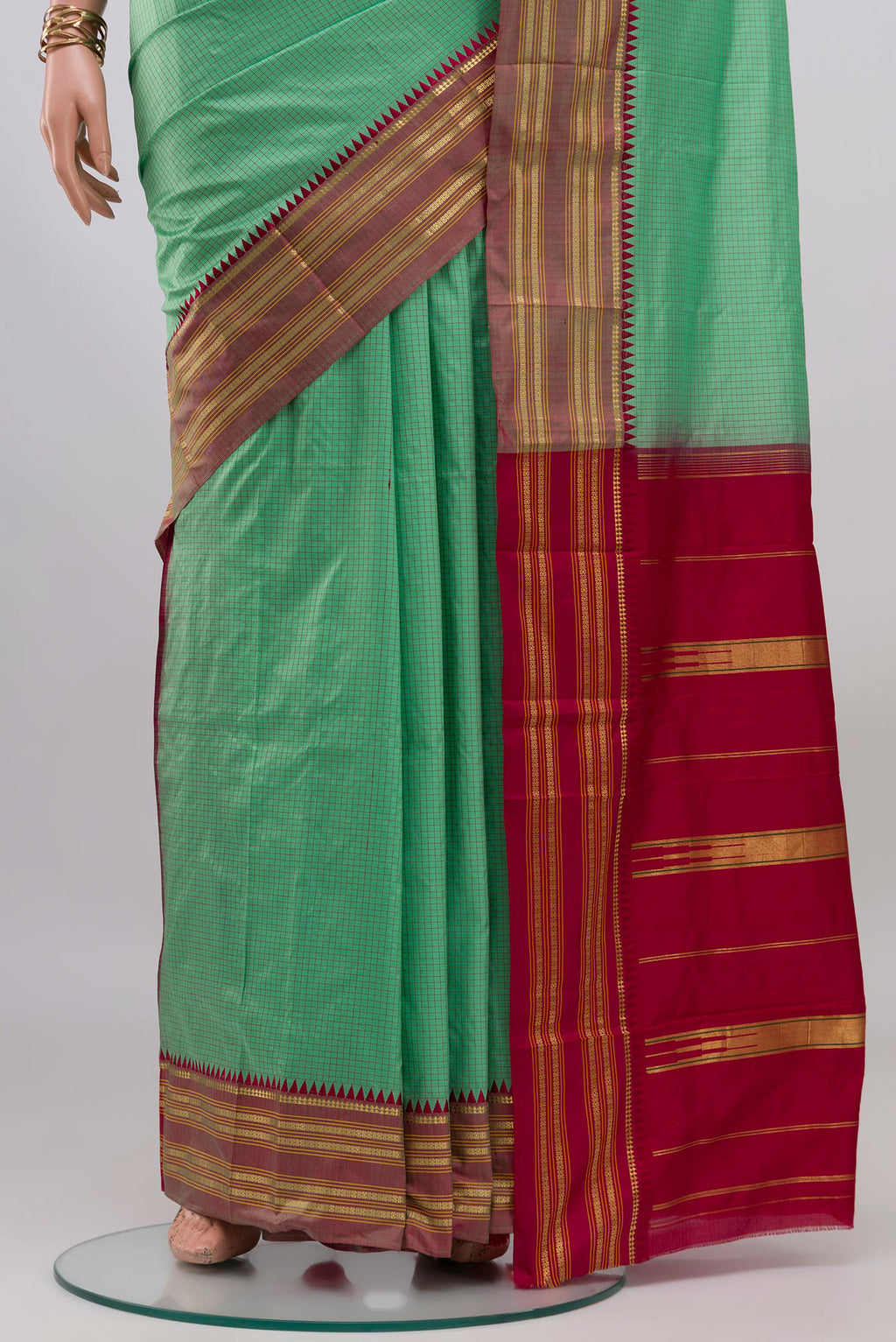 Pleats and pallu of Sea Green Narayanpet Silk Saree with Checked design on the body and Zari Border. 