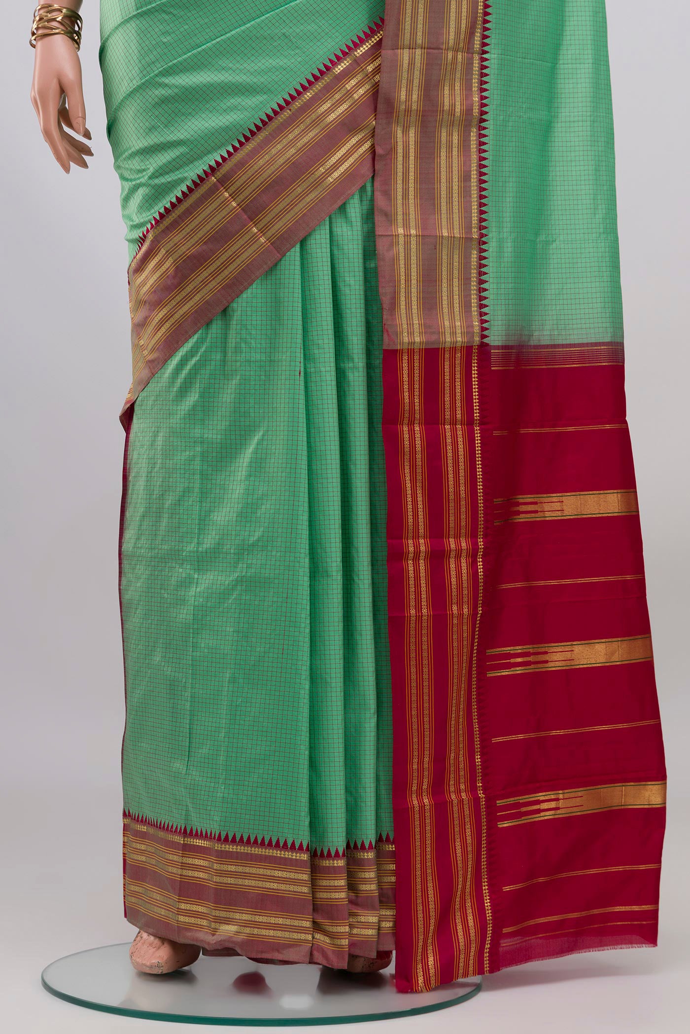 Pleats and pallu of Sea Green Narayanpet Silk Saree with Checked design on the body and Zari Border. 