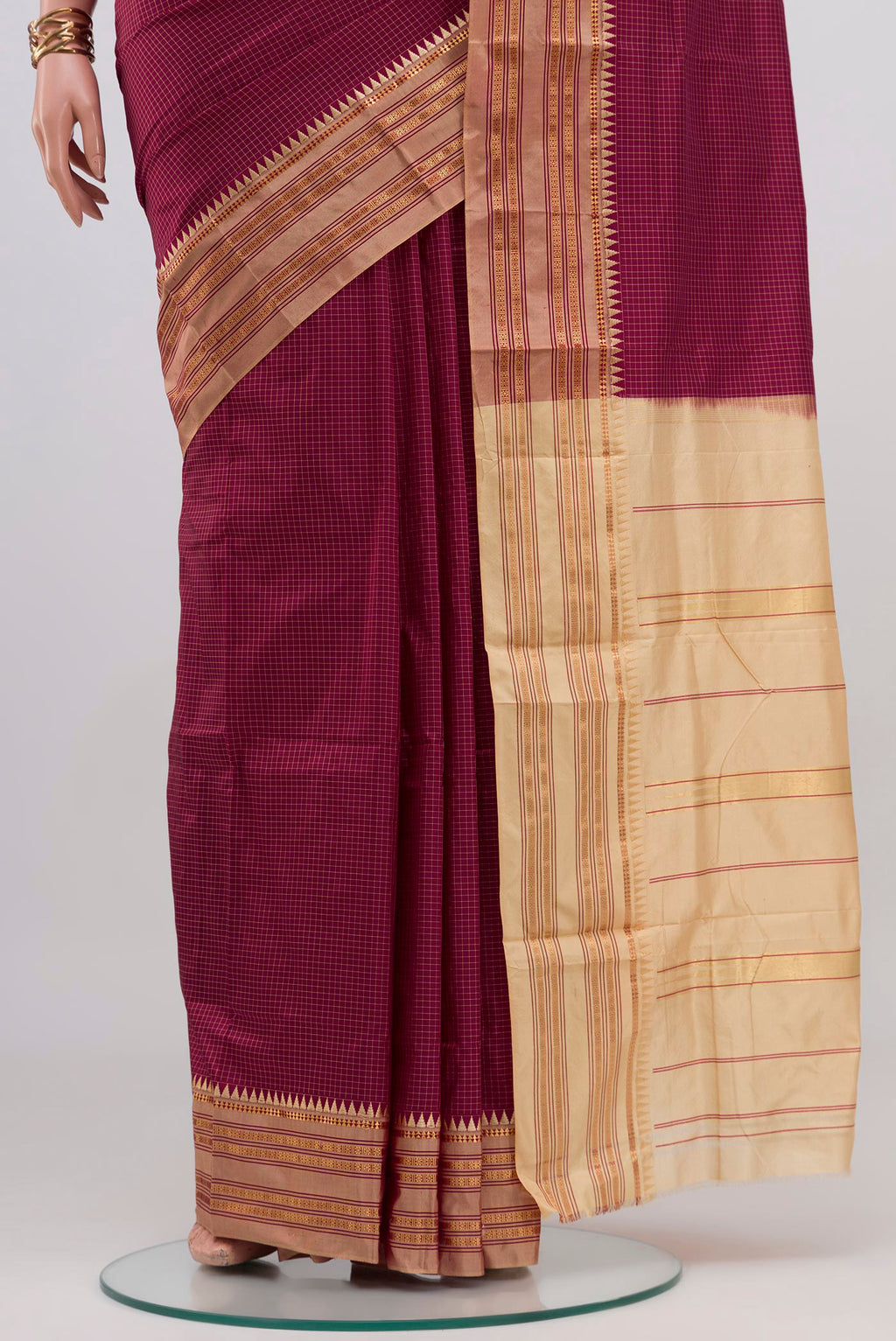 Pleats and pallu of Magenta Narayanpet Silk Saree with Checked design on the body and Thin Zari Line. 