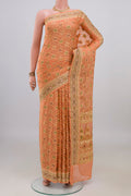 Peach Banarasi Georgette Saree with Thread Brocade on the body and Zari Border.  displayed on a mannequin