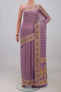 Lavender Banarasi Georgette Saree with Thread Butta on the body and Thread Border.  displayed on a mannequin