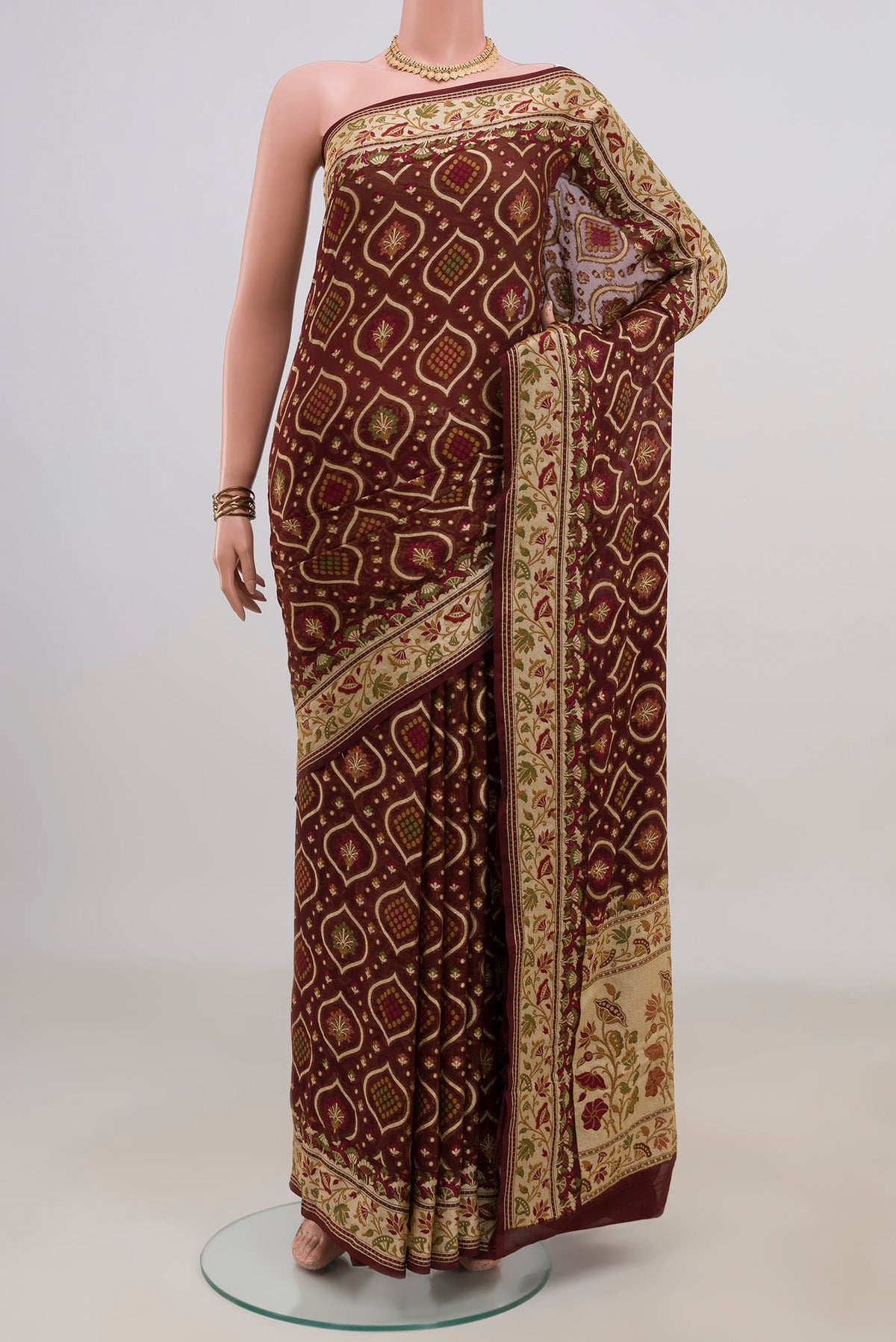Coffee Brown Banarasi Georgette Saree with Thread Brocade on the body and Fancy Border.  displayed on a mannequin