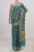 Blue Grey Banarasi Georgette Saree with Thread Butta on the body and Thread Border.  displayed on a mannequin