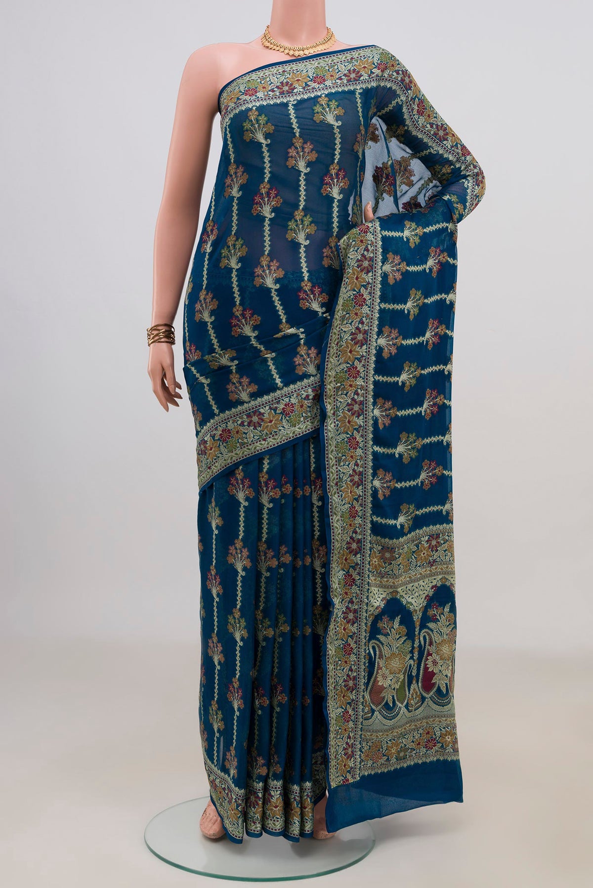Blue Banarasi Georgette Saree with Thread Butta on the body and Fancy Border.  displayed on a mannequin