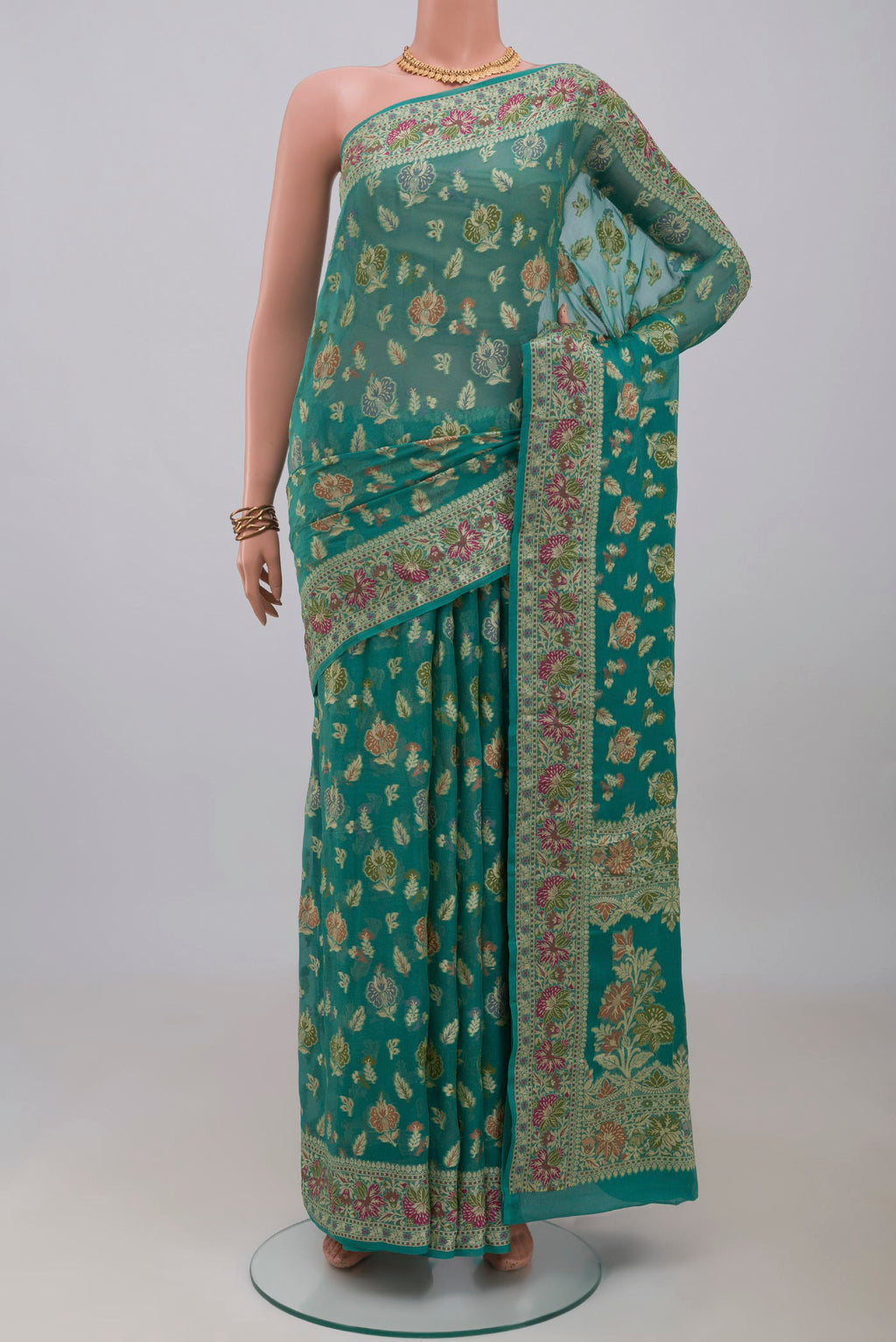 Blue Banarasi Georgette Saree with Thread Butta on the body and Thread Border.  displayed on a mannequin