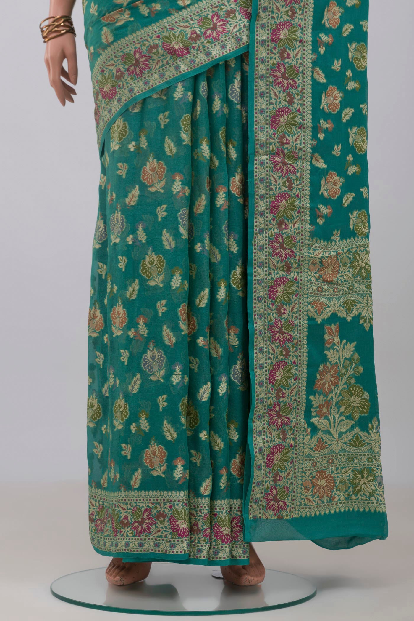 Pleats and pallu of Blue Banarasi Georgette Saree with Thread Butta on the body and Thread Border. 