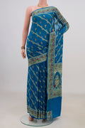 Blue Banarasi Georgette Saree with Thread Butta on the body and Fancy Border.  displayed on a mannequin