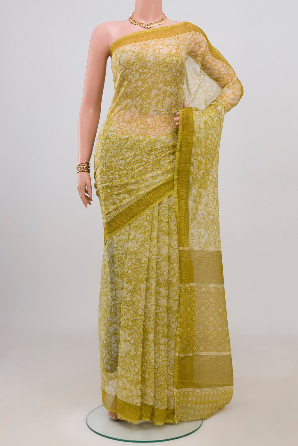 Light Green Mysore Chiffon Saree with Floral Print on the body and Without Border.  displayed on a mannequin