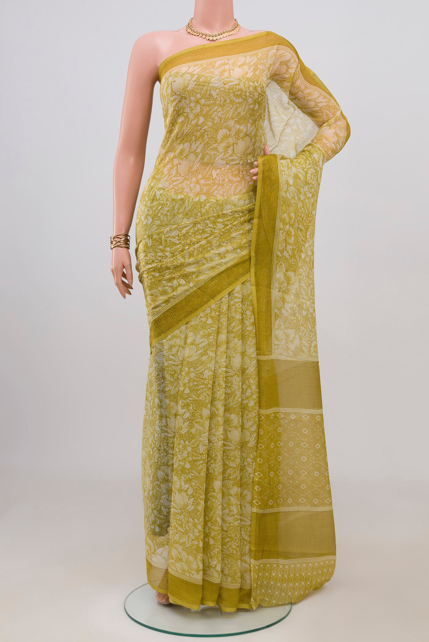 Light Green Mysore Chiffon Saree with Floral Print on the body and Without Border.  displayed on a mannequin