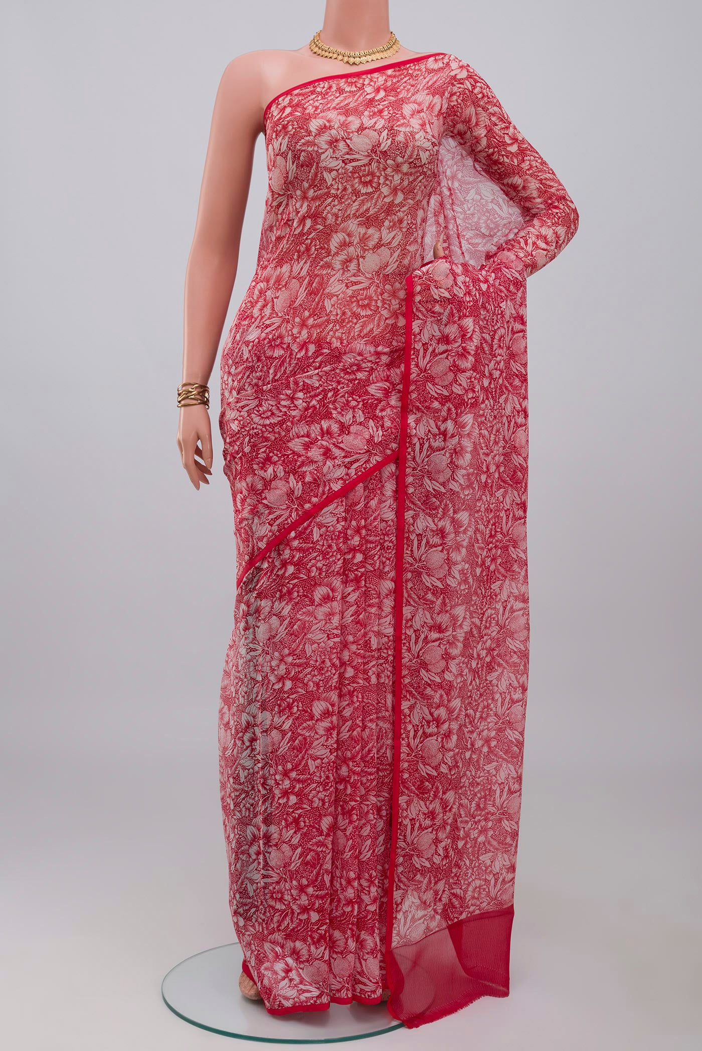 Red Mysore Chiffon Saree with Printed design on the body and Without Border.  displayed on a mannequin