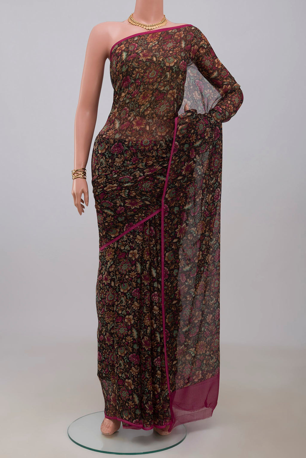 Black Mysore Chiffon Saree with Printed design on the body and Without Border.  displayed on a mannequin