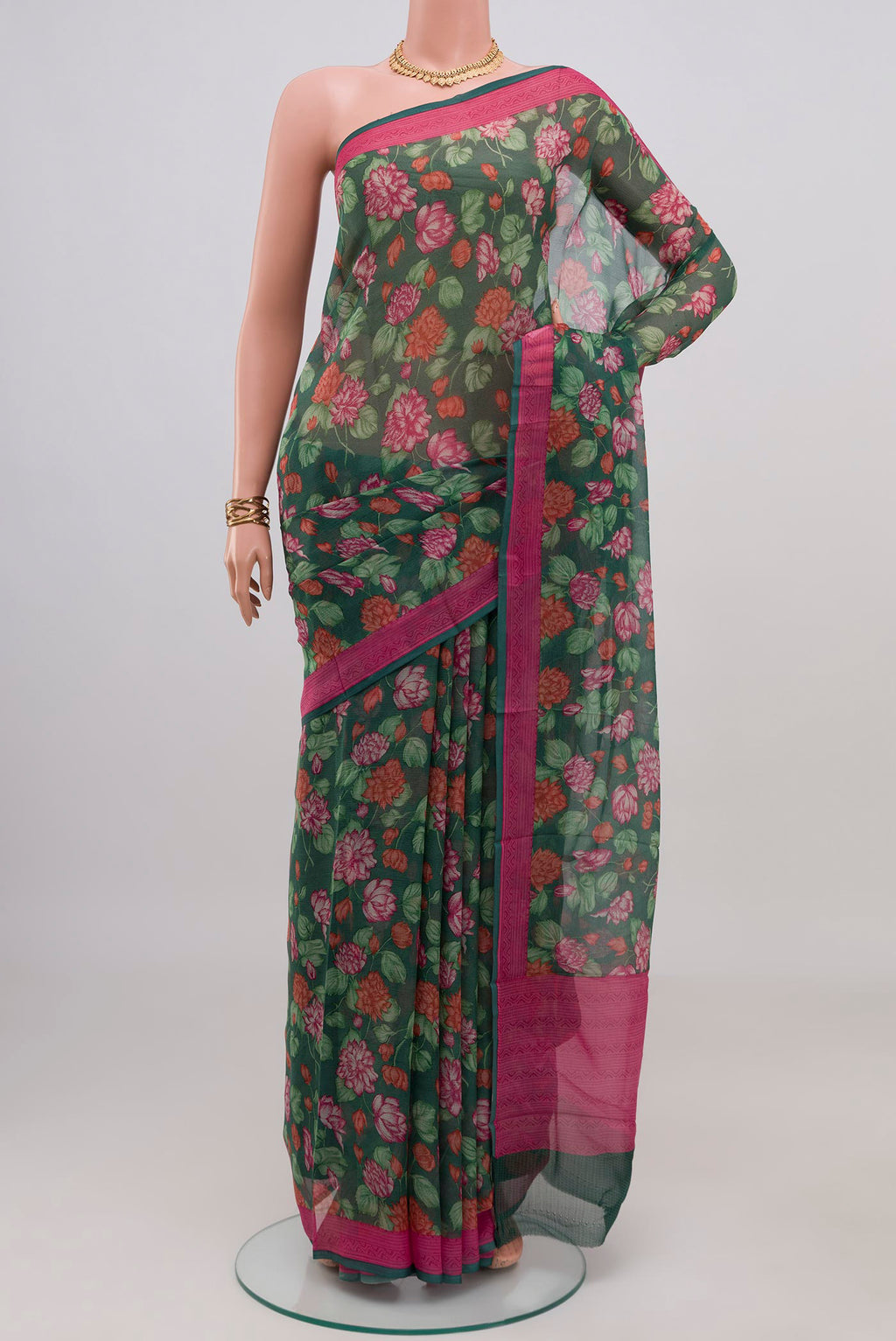 Green Mysore Chiffon Saree with Floral Print on the body and Printed Border.  displayed on a mannequin