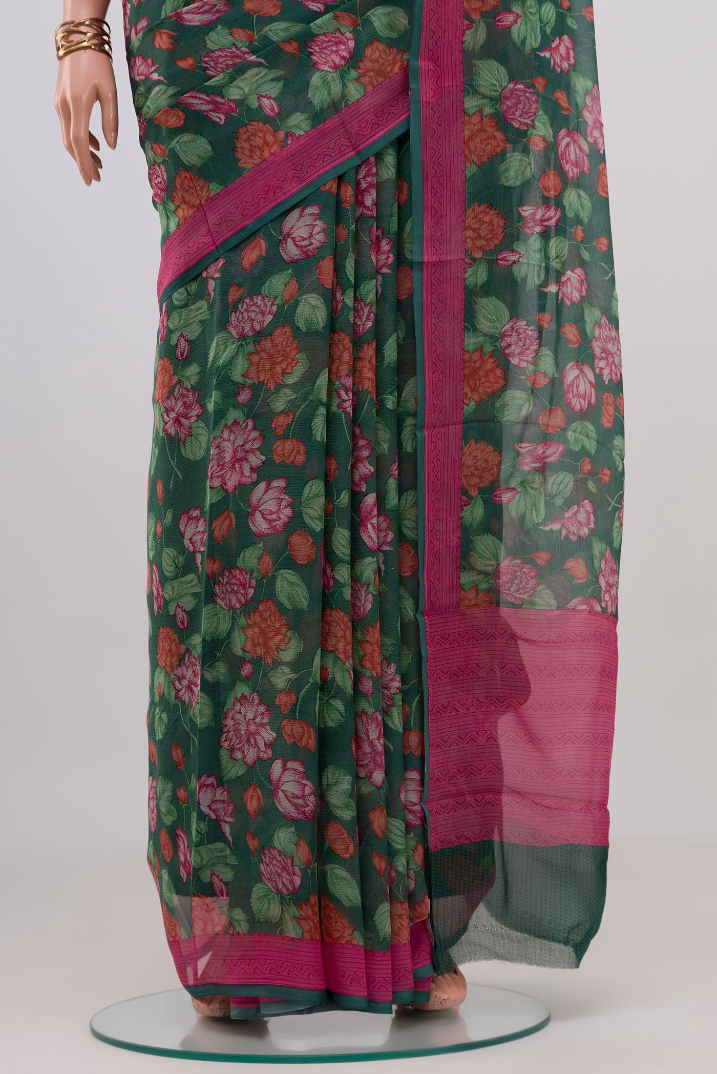 Pleats and pallu of Green Mysore Chiffon Saree with Floral Print on the body and Printed Border. 