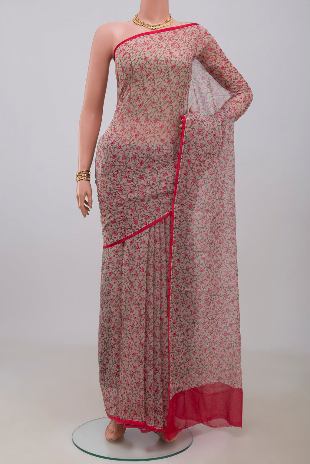 Grey Mysore Chiffon Saree with Printed design on the body and Without Border.  displayed on a mannequin