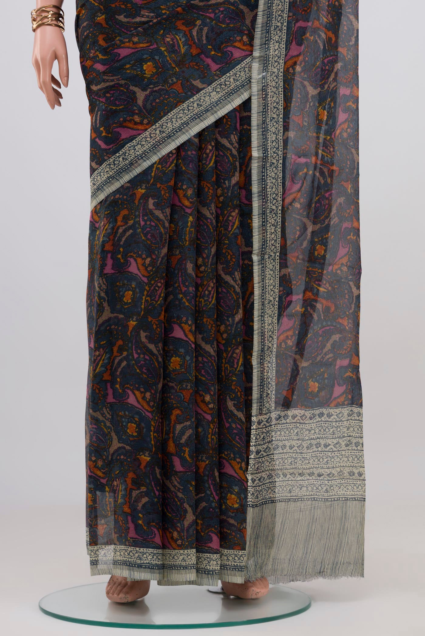 Pleats and pallu of Blue Mysore Chiffon Saree with Printed design on the body and Without Border. 