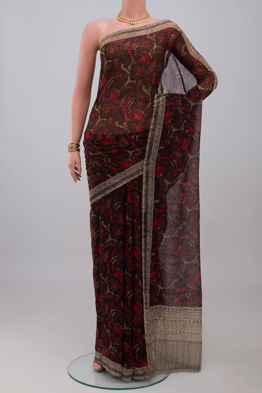 Black Mysore Chiffon Saree with Printed design on the body and Printed Border.  displayed on a mannequin