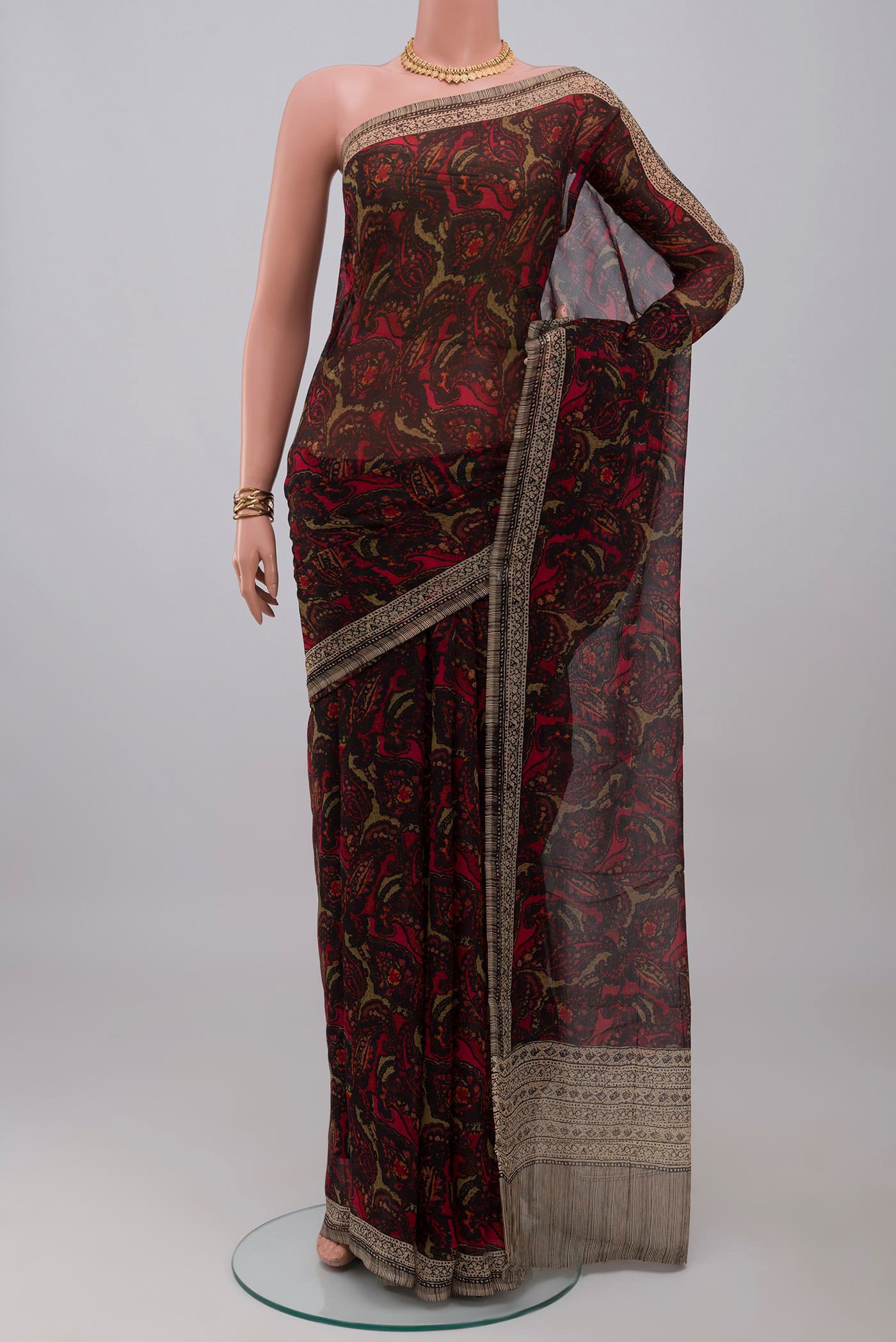 Black Mysore Chiffon Saree with Printed design on the body and Printed Border.  displayed on a mannequin