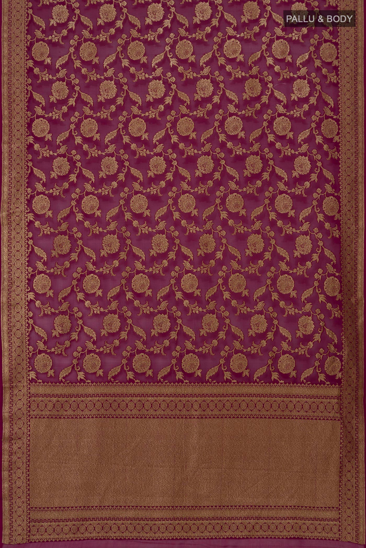 Flat view of Magenta Banarasi Georgette Saree with Zari Brocade on the body and Zari Border. 