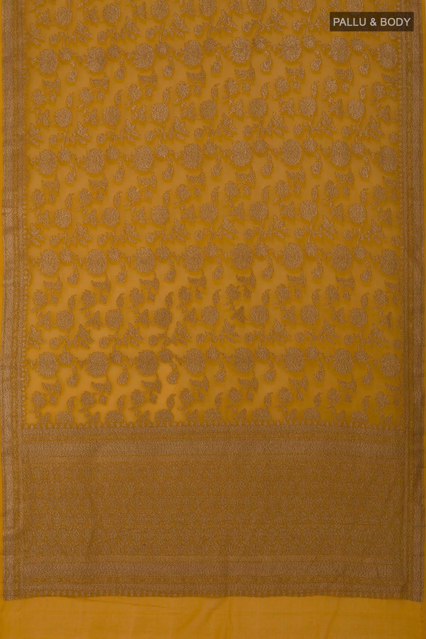 Flat view of Mustard Banarasi Georgette Saree with Zari Brocade on the body and Zari Border. 