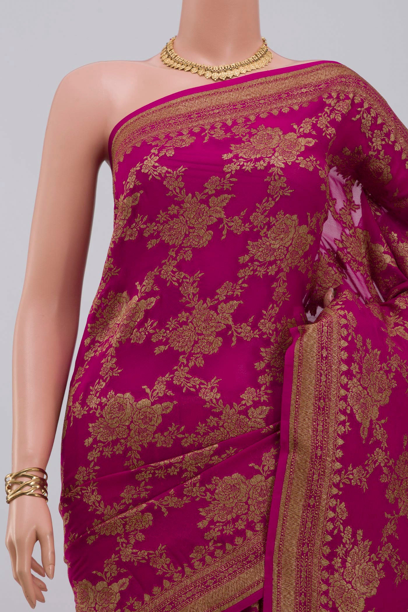 Border image of Pink Georgette Saree with Fancy on the body and Fancy Border. 