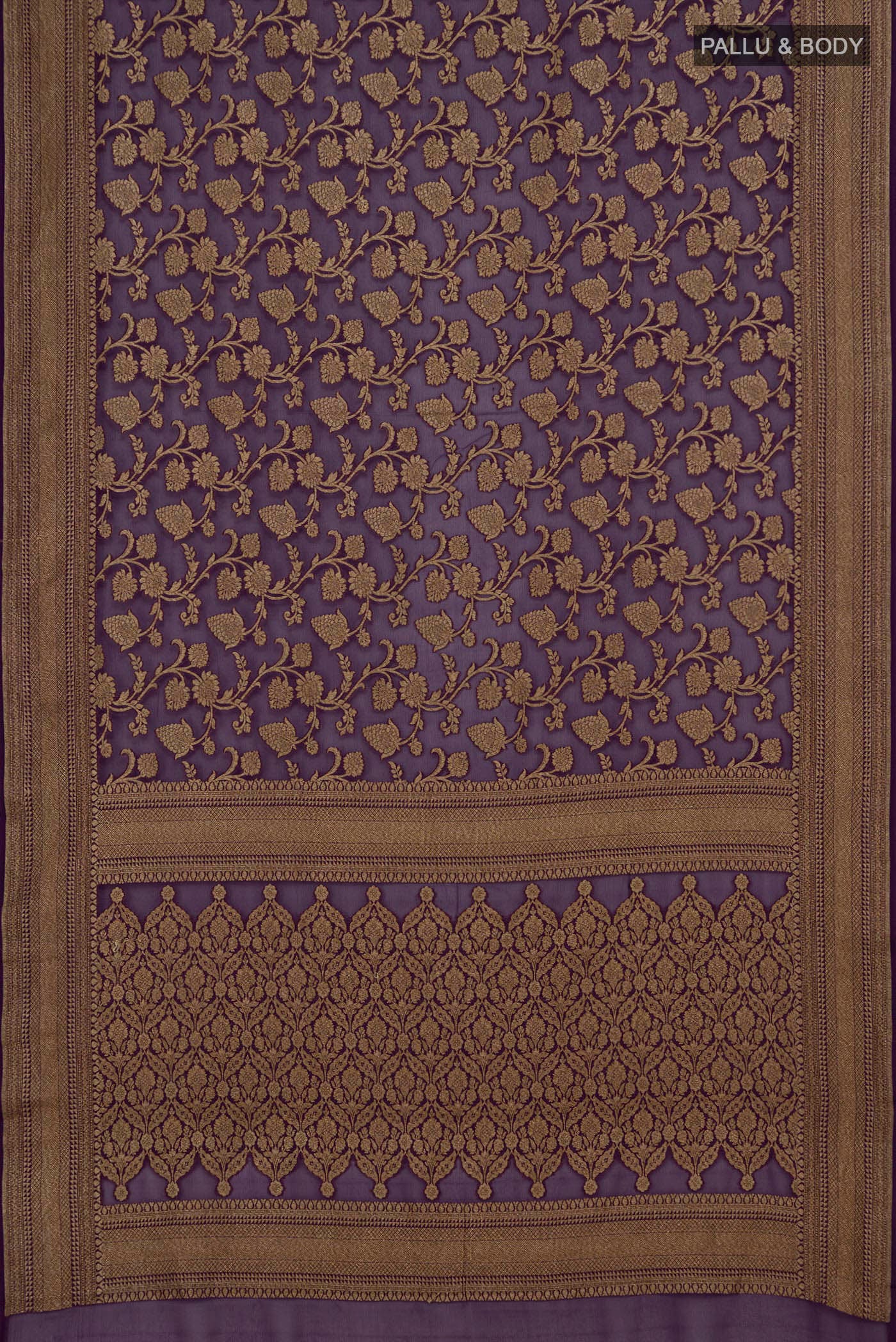 Flat view of Purple Banarasi Georgette Saree with Zari Brocade on the body and Zari Border. 