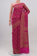 Rani Pink Banarasi Georgette Saree with Zari Butta on the body and Zari Border.  displayed on a mannequin