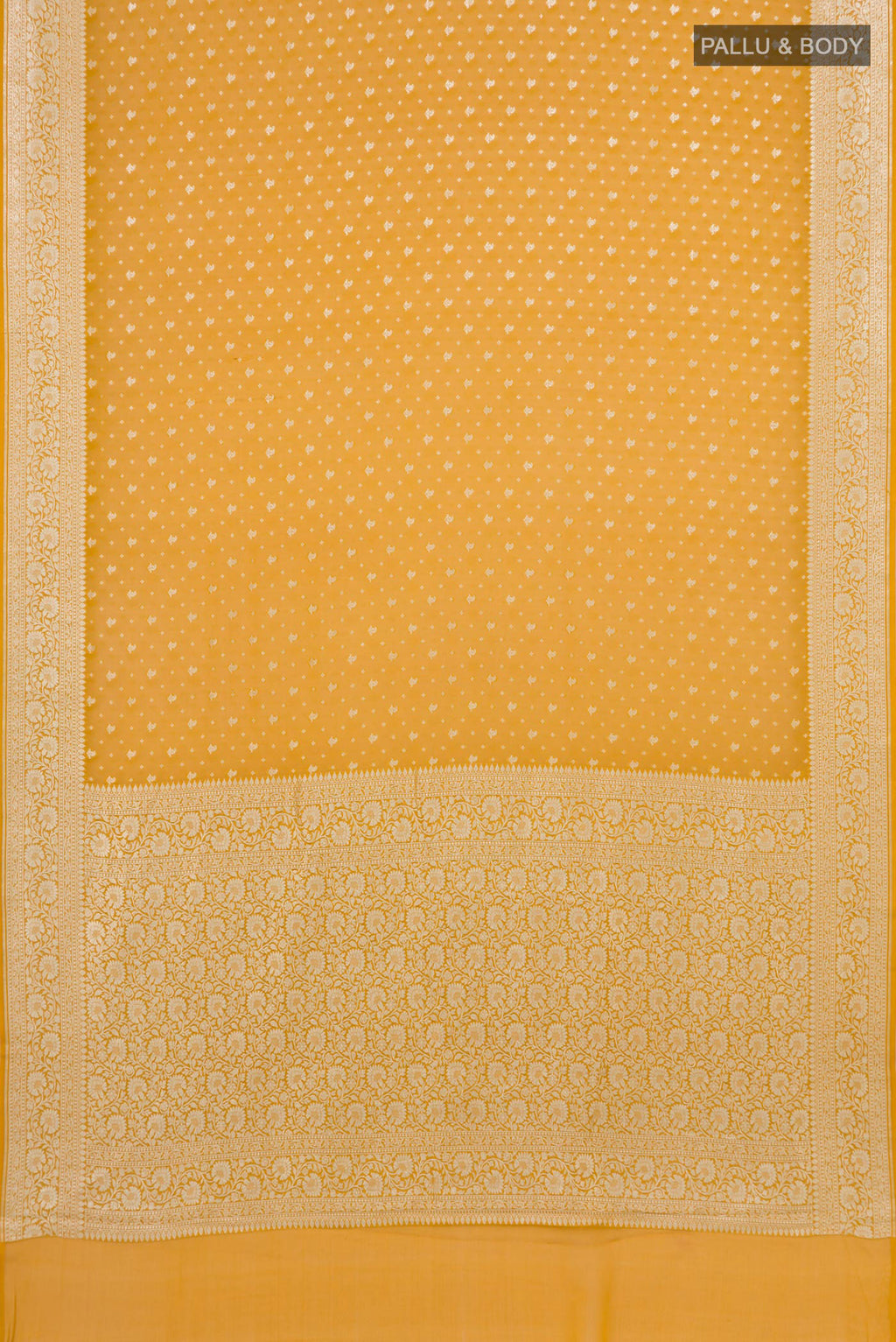 Flat view of Mustard Banarasi Georgette Saree with Zari Butta on the body and Zari Border. 