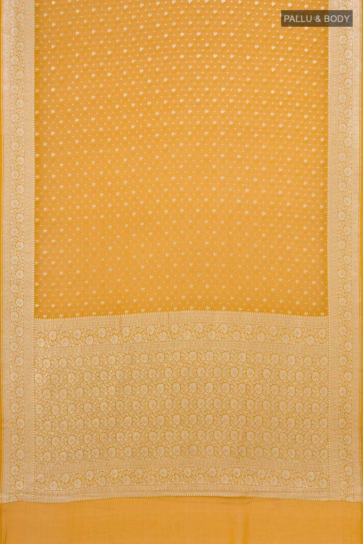 Flat view of Mustard Banarasi Georgette Saree with Zari Butta on the body and Zari Border. 
