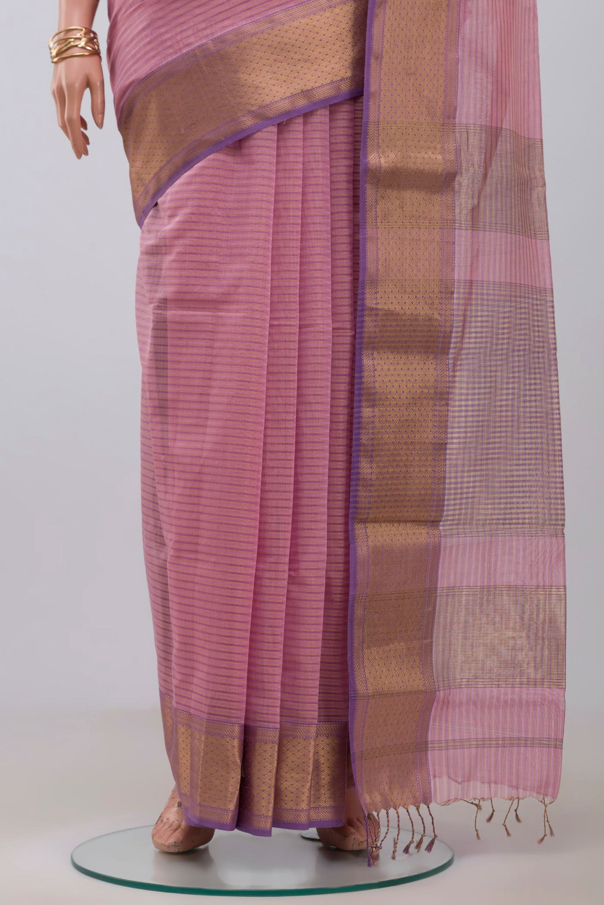 Pleats and pallu of Pink Maheshwari Silk Cotton Saree with Stripes on the body and Zari Border. 