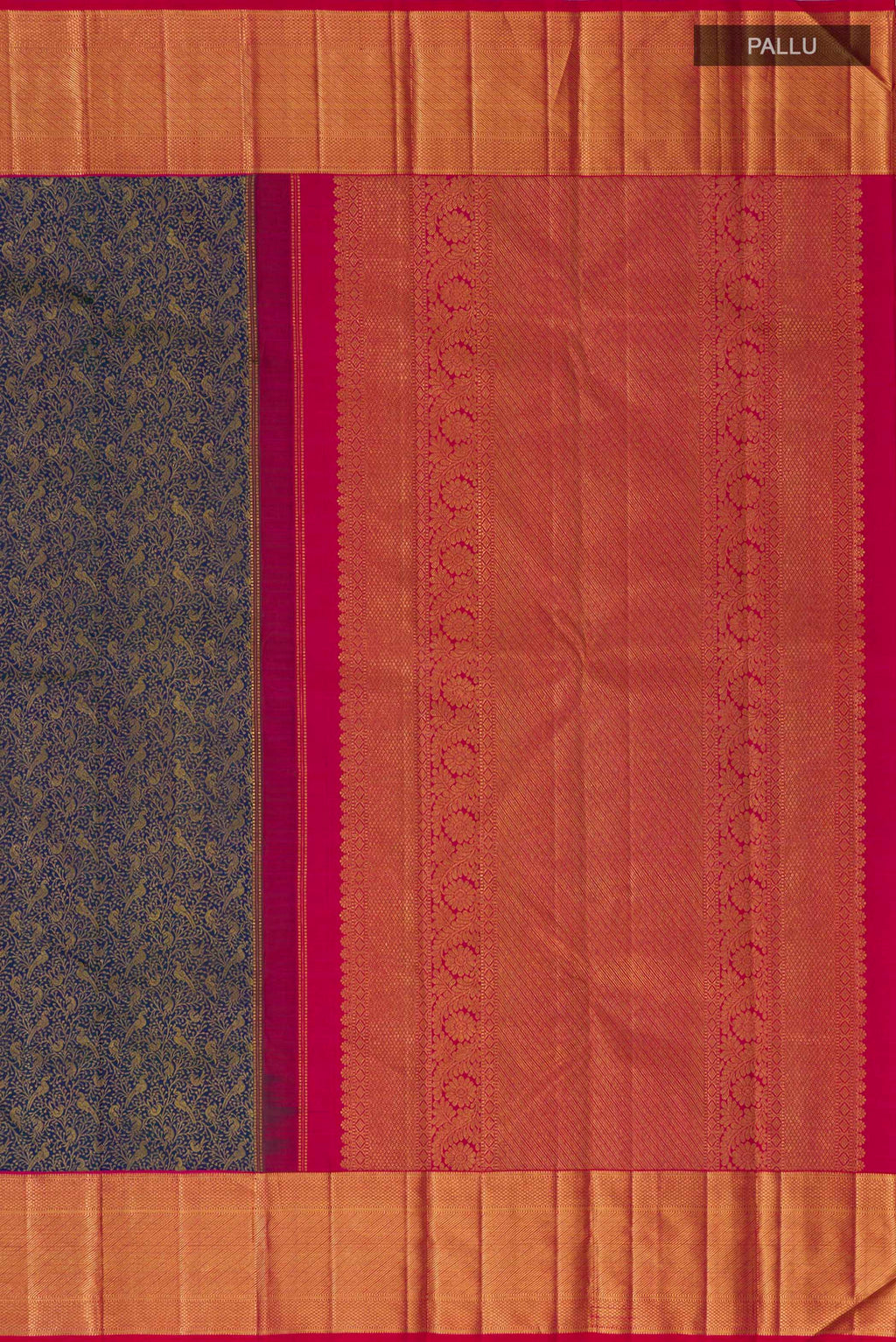 Close up image of the pallu of Blue Kanchipuram Silk Saree with Zari Brocade on the body and Zari Border. 