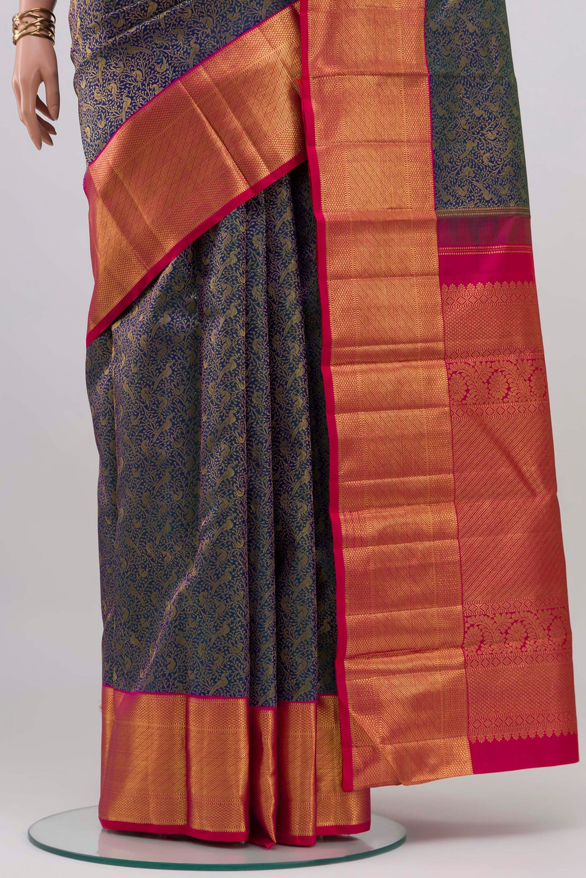 Pleats and pallu of Blue Kanchipuram Silk Saree with Zari Brocade on the body and Zari Border. 
