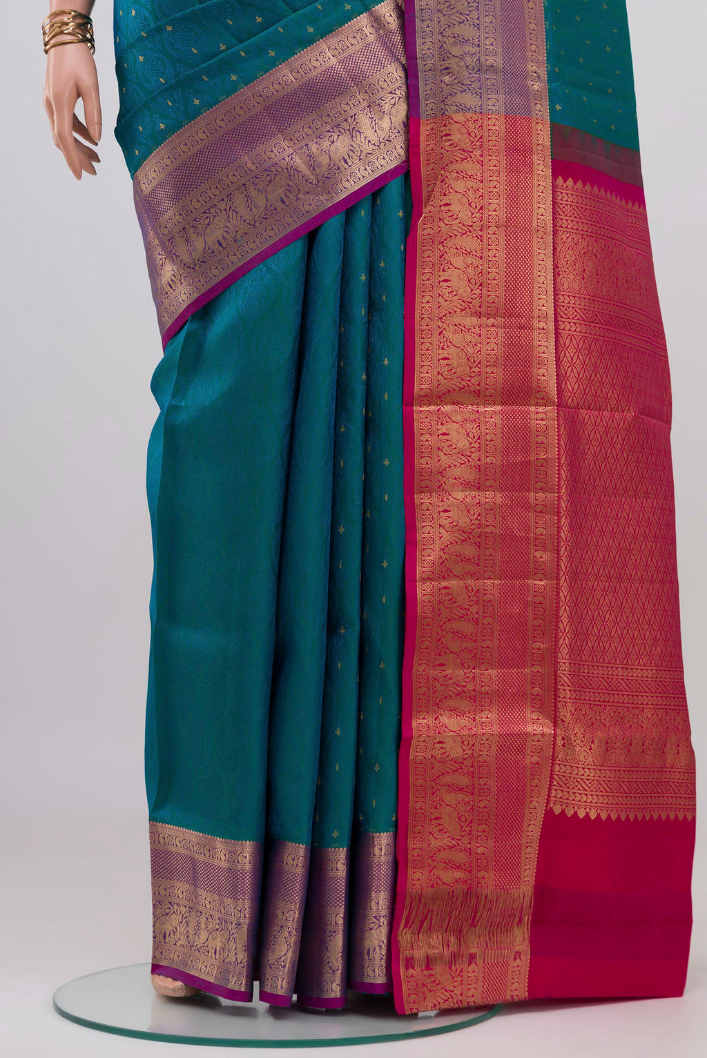Pleats and pallu of Blue Soft Silk Saree with Jacquard design on the body and Zari Border. 
