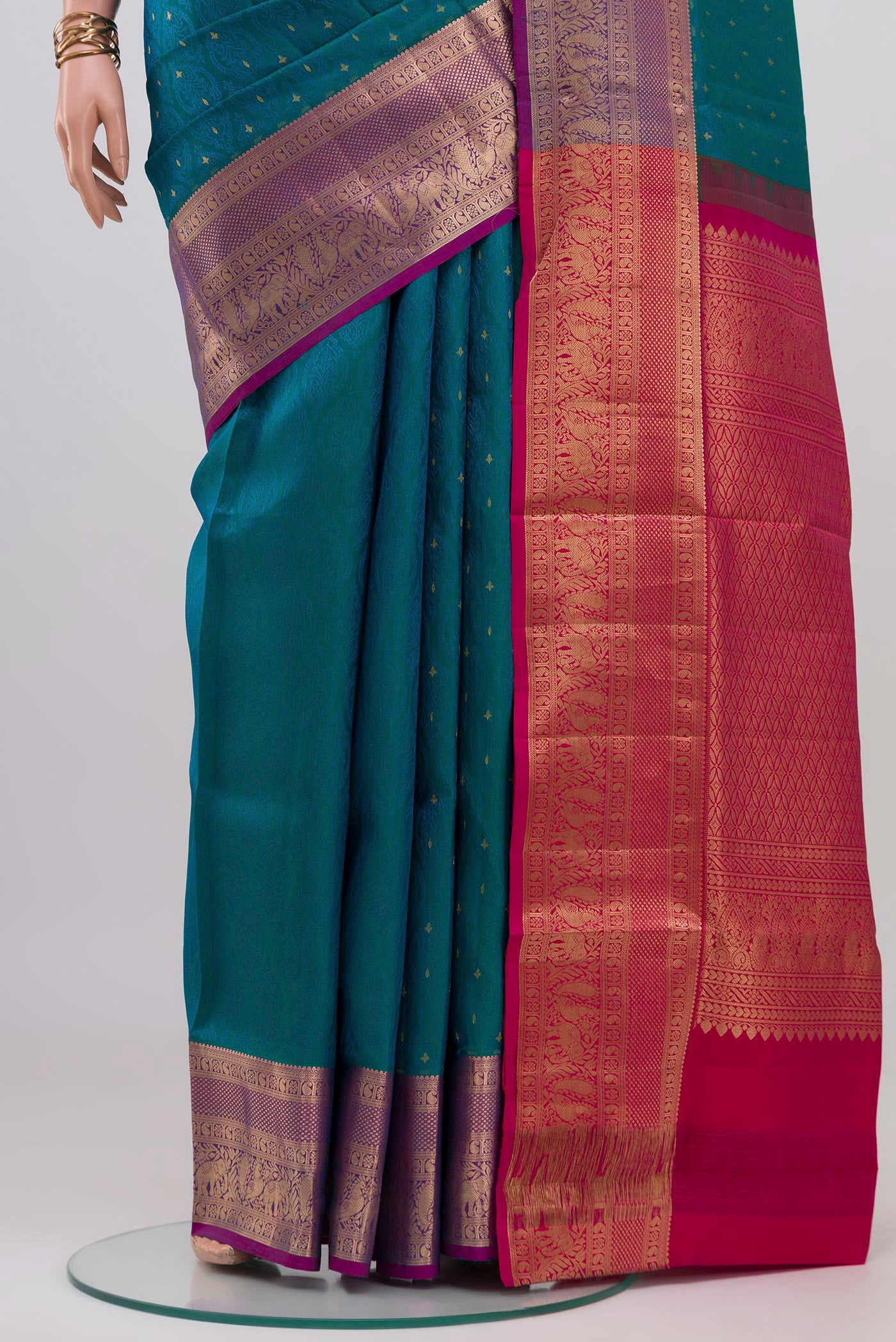 Pleats and pallu of Blue Soft Silk Saree with Jacquard design on the body and Zari Border. 