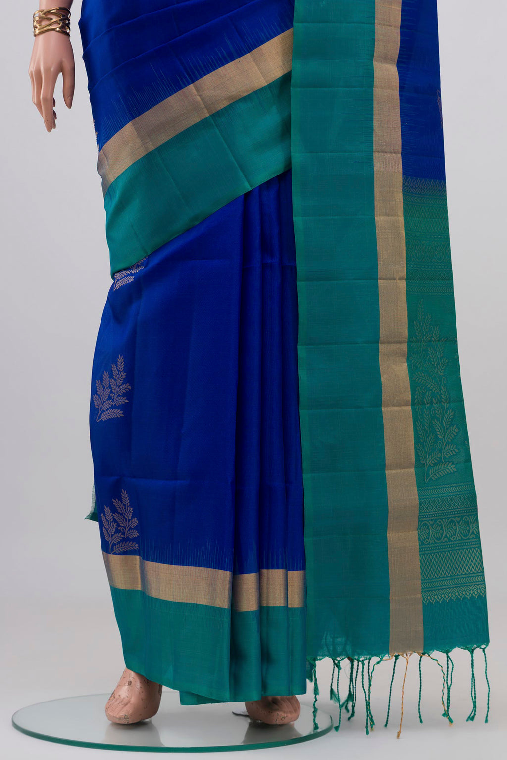 Pleats and pallu of Royal Blue Soft Silk Saree with Zari Butta on the body and Thin Zari Line. 