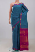 Pure Silk Pure Zari Blue Kanjivaram Saree with Checked design on the body and Fancy Border.  displayed on a mannequin