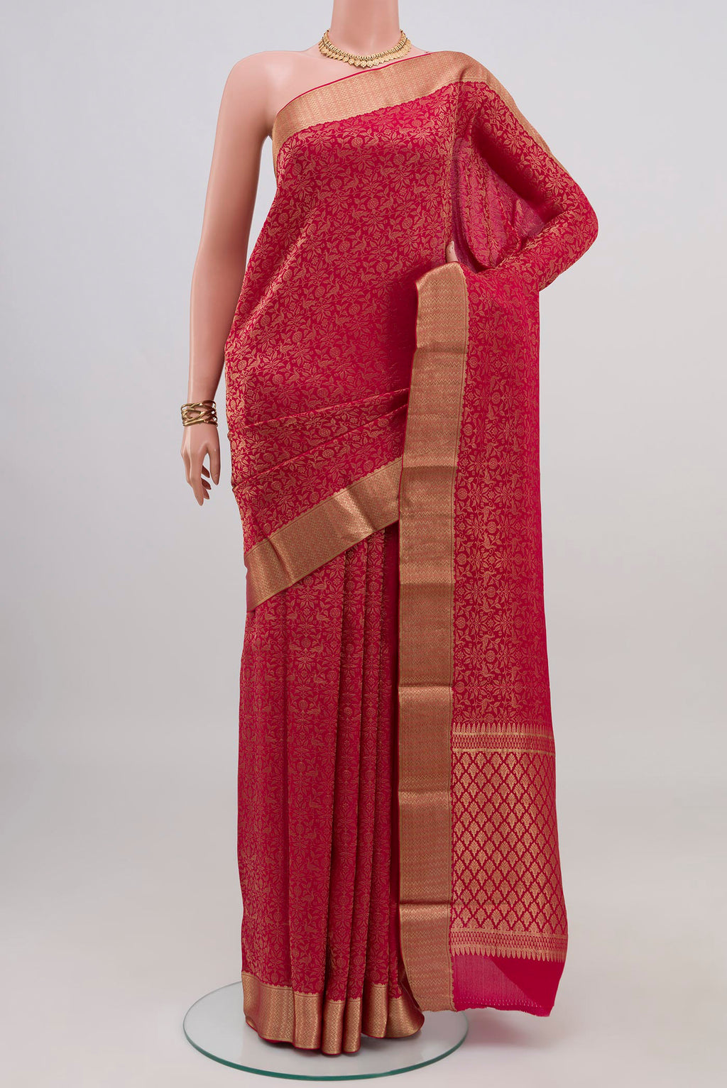 Pink Mysore Crepe Saree with Zari Brocade on the body and Zari Border.  displayed on a mannequin